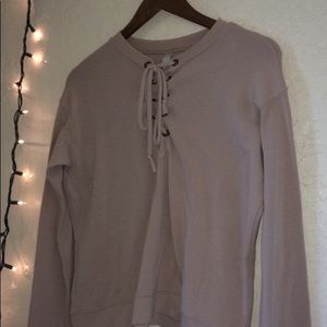 beige colored long sleeve lace up